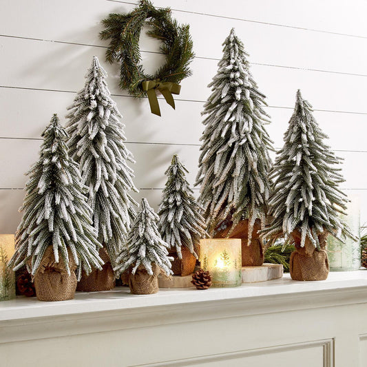 Snow Covered Christmas Trees for tabletops
snow capped christmas tree
small christmas tree table decorations
snow covered christmas tree decoration ideas