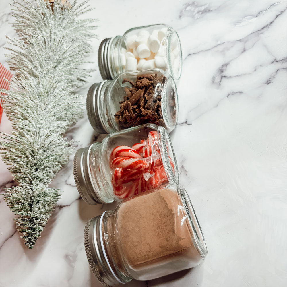 Edible Christmas Spoons
Edible Christmas Stirrers
hot chocolate gift in mason jar
hot chocolate gift kits
hot chocolate christmas gift ideas