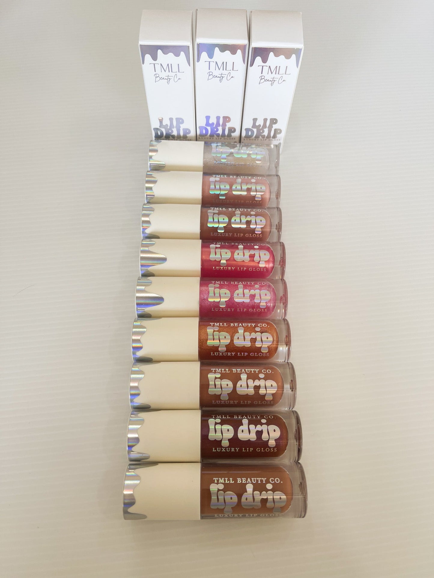 Lip Drip Luxury Gloss by TMLL